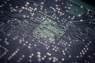 horizontal shot of an electronic micro circuit.