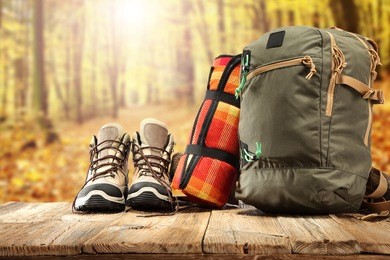 backpack shoes and forest of sun light 