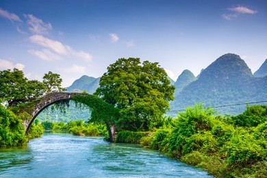 yangshuo, china at the dragon bridge spanning the li river.