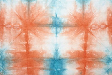 abstract tie dyed fabric background 