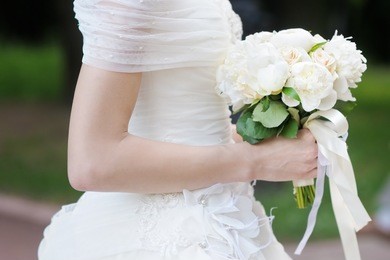 bride holding wedding flowers bouquet