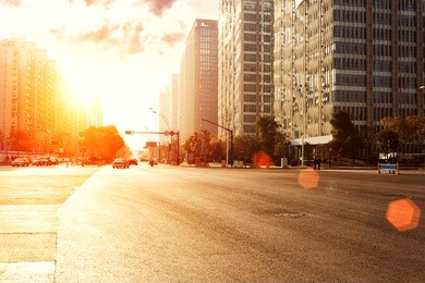skyline,urban road and office buildings at sunset
