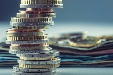 euro coins stacked on each other in different positions.