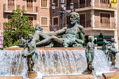 square of saint mary's and fountain rio turia  in valencia in a summer day, spain