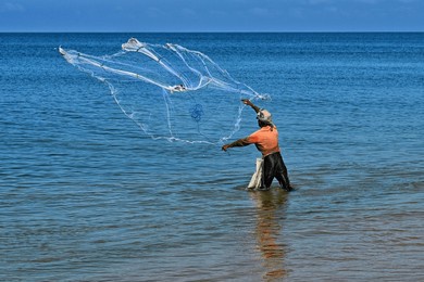 negambo sri lanka beach fishing with net 