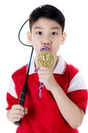 happy asian boy in badminton action isolate on white background 