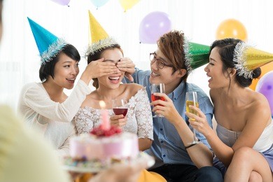 friends preparing their girlfriend for surprise