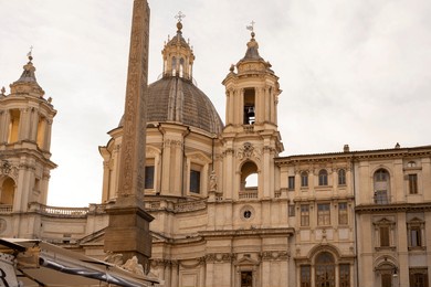 santa maria di loreto is a 16th-century church in rome, central italy, located just across the street from the trajan's column, near the giant monument of vittorio emanuele ii.