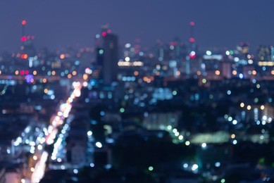 abstract urban night light bokeh , defocused background