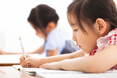 happy children study in the classroom