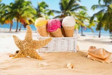 ice cream scoops on sandy beach, close-up.
