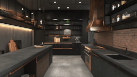 blurred background of sleek and stylish design of this urban industrial kitchen. featuring a blend of modern materials with a cozy atmosphere, it's perfect for cooking and entertaining.