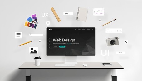 web design interface displayed on desktop screen, surrounded by floating ui components like buttons, image boxes, and navigation icons, along with creative tools