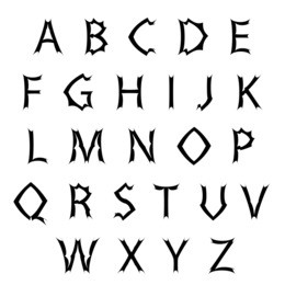 geometric font in gothic style. black font on light background.