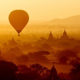 air balloons over buddhist temples at sunrise. bagan, myanmar.