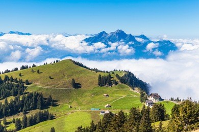 stunning view of the pilatus above the clouds from top of rigi mountain, lucerne, switzerland