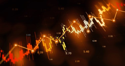 glowing orange candlestick and line chart set against a dark grid background, symbolizing dynamic stock market trading, investment analytics, financial growth, trend forecasting, and technological mar