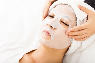  young lady with facial mask at spa