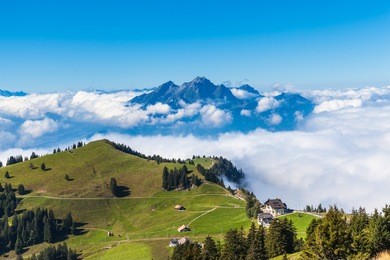 stunning view of the pilatus above the clouds from top of rigi mountain, lucerne, switzerland