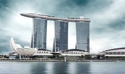 urban landscape of singapore under a cloudy sky