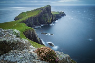 neist point lighthouse on a cloudy day, isle of skye, scotland, uk