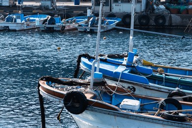 fishing boats moored at the harbor