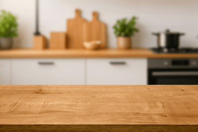 kitchen wood table top for product display with blurred modern interior. wooden tabletop over defocused kitchen background. kitchen furniture and desk space. product promotion in the kitchen
