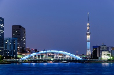 beautiful night view of tokyo skyline and sumida river