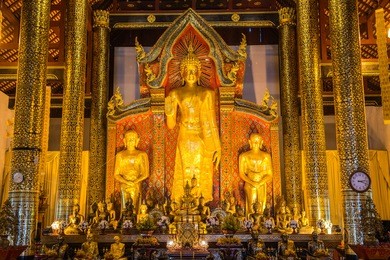 standing buddha  at wat chedi luang temple, thailand.