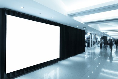 billboard in shopping mall corridor