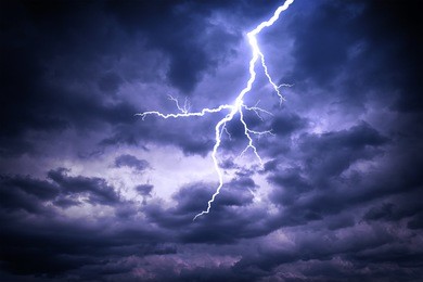 lightning strike on the dark cloudy sky