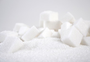 lump sugar on white background