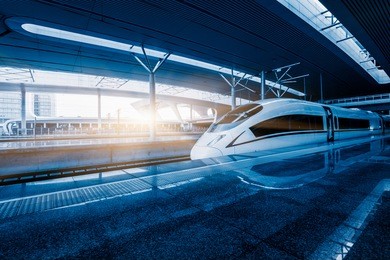 speeding train away from railway station, shanghai china.