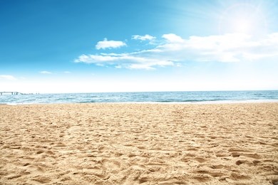 sun of summer time on sky and sand of beach 