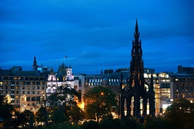edinburgh city view with scott monument at night in uk.