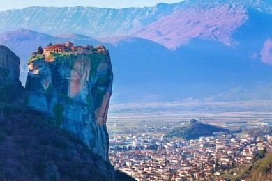the photo of the holy trinity monastery on top of the cliff, meteora near kalabaka, trikala, greece