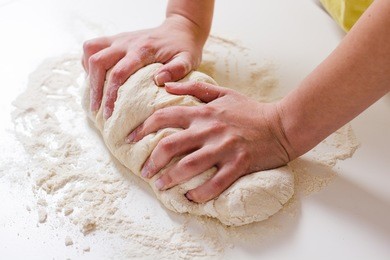 female hands making dough for baking .homemade preparing food.