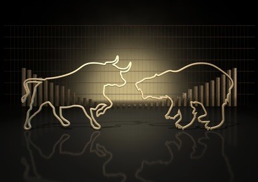 an abstract closeup of two gold outlines depicting a stylized bull and a bear representing financial market trends on a bar graph background 