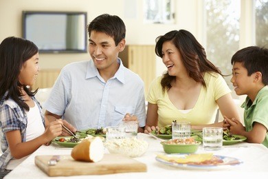 asian family sharing meal at home