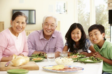 asian family sharing meal at home