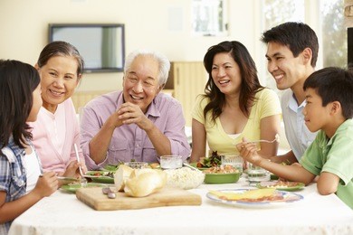 asian family sharing meal at home
