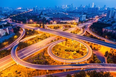 an overpass closeup on the junction at night in tianjin, china