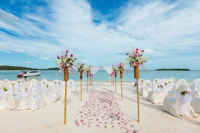 wedding flower setting on the beach