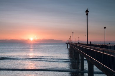 early morning at new brighton pier. christchurch, new zealand