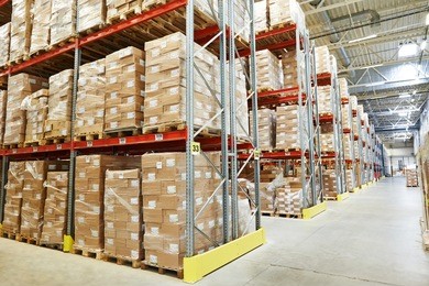 interior of modern warehouse. rows of shelves with boxes