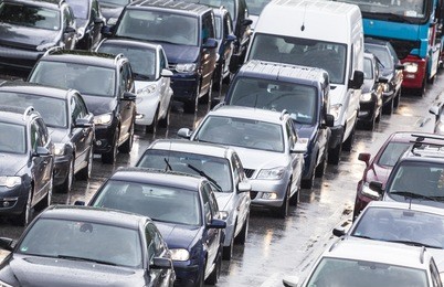 cars cueing in city traffic in hamburg, germany