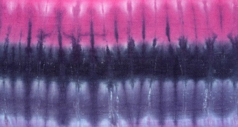 tie dyed pattern on cotton fabric for background.
