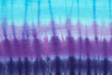 tie dyed pattern on cotton fabric for background.
