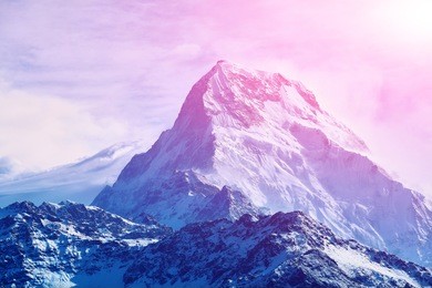 beautifull cloudy sunrise in the mountains with snow ridge