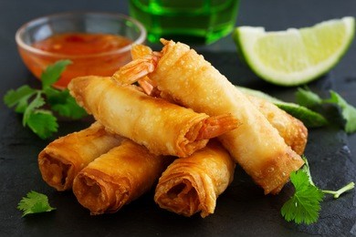 spring rolls with shrimp with sweet chili sauce. asian cuisine.